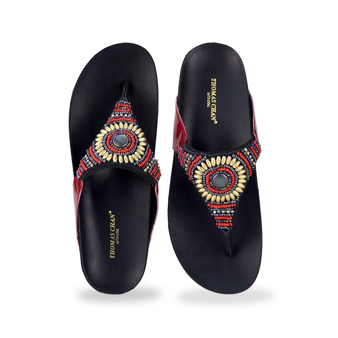 Front view of Thomas Chan's Boho Beaded Flatform Flip-Flops in red, showcasing the boho beaded design and LiteStep flatform footbed. The image highlights the flip-flops' boho beaded accents and casual style.