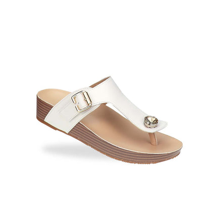 Diagonal view of Thomas Chan’s Dazzle Crystal Adjustable Flip-Flops in ivory, featuring a sparkling crystal stone, adjustable buckle strap, and LiteStep flatform footbed, highlighting their casual yet elegant style.