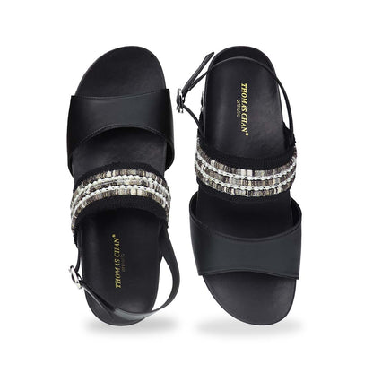 Front view of Thomas Chan’s Summer Love Duo-Strap Slingback Sandals in black, featuring elegant duo straps, a secure slingback design, and a LiteStep flatform sole with light arch support, highlighting their casual yet sophisticated style.