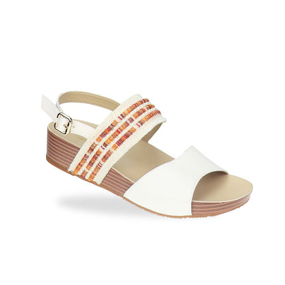 Diagonal view of Thomas Chan’s Summer Love Duo-Strap Slingback Sandals in ivory with a subtle touch of orange, featuring elegant duo straps, a secure slingback design, and a LiteStep flatform sole with light arch support, highlighting their casual yet sophisticated style.