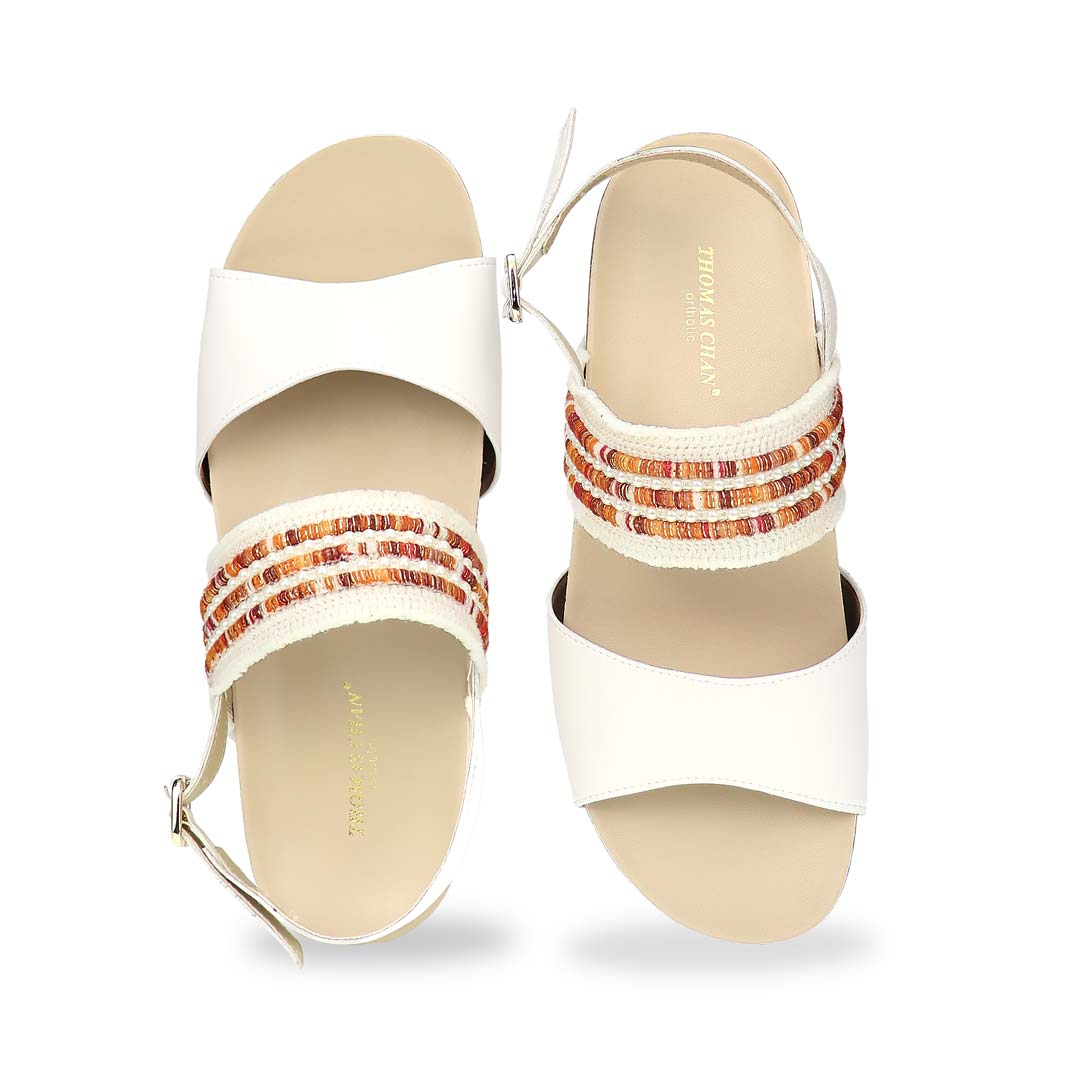 Front view of Thomas Chan’s Summer Love Duo-Strap Slingback Sandals in ivory with a subtle touch of orange, featuring elegant duo straps, a secure slingback design, and a LiteStep flatform sole with light arch support, highlighting their casual yet sophisticated style.