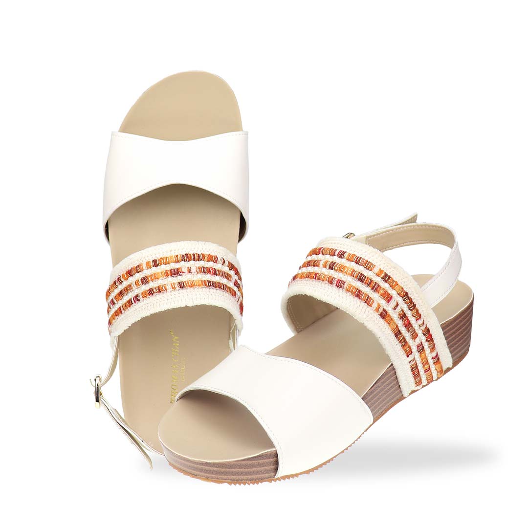 Full view of Thomas Chan’s Summer Love Duo-Strap Slingback Sandals in ivory with a subtle touch of orange, featuring elegant duo straps, a secure slingback design, and a LiteStep flatform sole with light arch support, highlighting their casual yet sophisticated style.