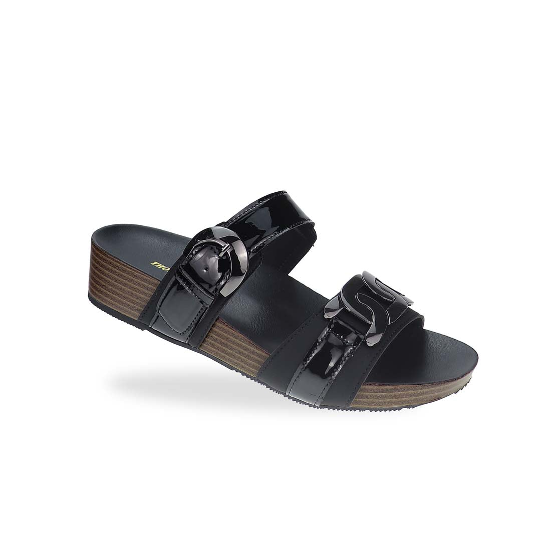 Diagonal view of Thomas Chan’s Metallic Duo-Strap Adjustable Sandals in black, showcasing sleek metallic straps, an adjustable buckle for a perfect fit, and a LiteStep flatform footbed for added comfort.