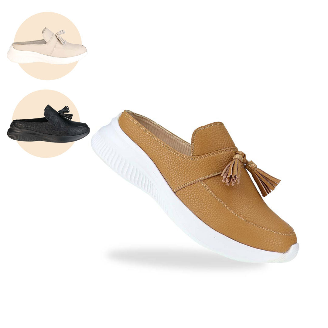 Thomas Chan Feather-Light Tassel Slide-On Loafers in camel, featuring a tassel bell design. Also available in ivory & black.