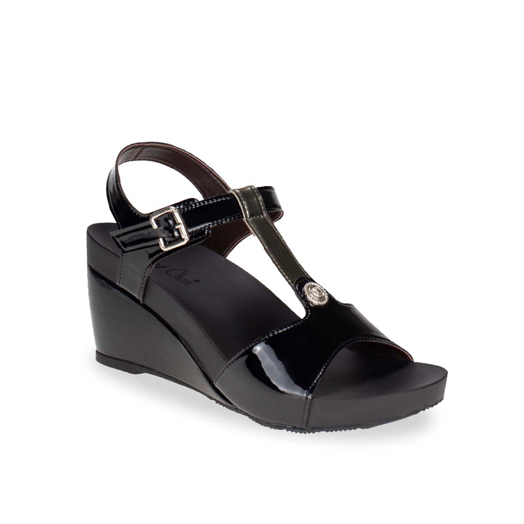 Diagonal view of Thomas Chan black and silver T-strap design with colour-matching detail comfortable wedge sandal shoe.