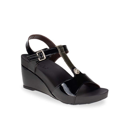 Diagonal view of Thomas Chan black and silver T-strap design with colour-matching detail comfortable wedge sandal shoe.