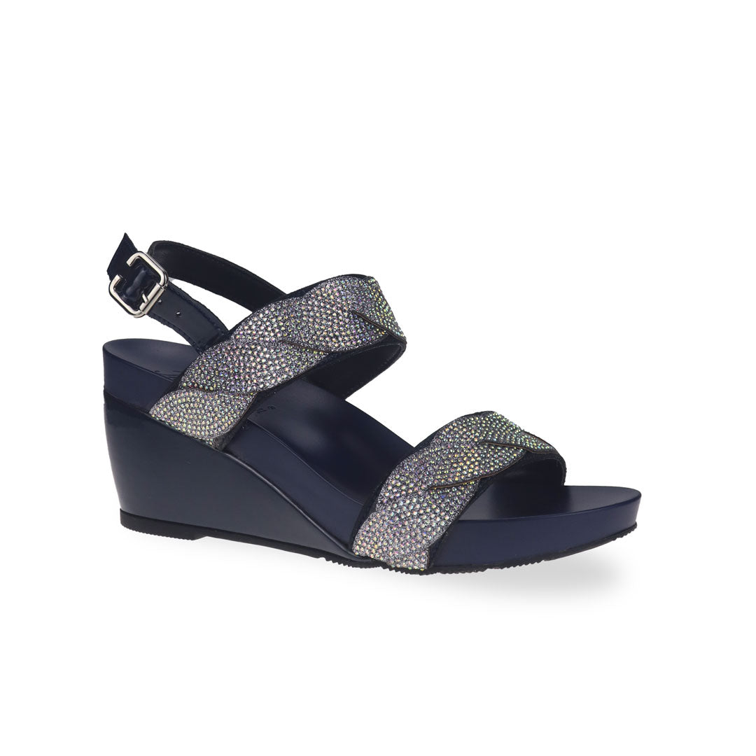 Diagonal view of Thomas Chan's high-heeled wedge sandals in vibrant blue, featuring intricate diamond braiding and a chic slingback design with buckle