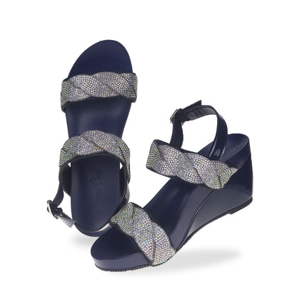 Full view of Thomas Chan's high-heeled wedge sandals in vibrant blue, featuring intricate diamond braiding and a chic slingback design with buckle