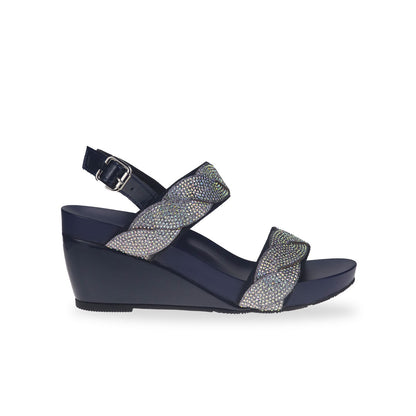 Side view of Thomas Chan's high-heeled wedge sandals in vibrant blue, featuring intricate diamond braiding and a chic slingback design with buckle