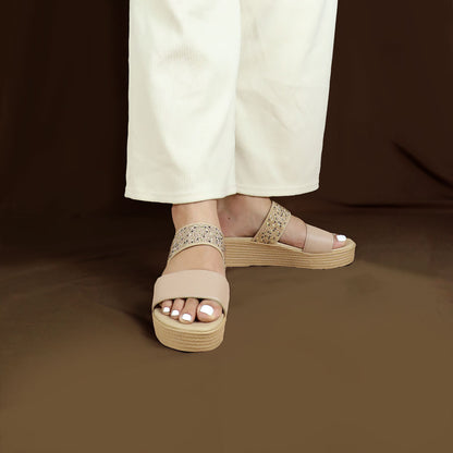 Model wearing size 37  Thomas Chan Boho Rhinesstone Flatform sandals in cream from the standing front view, featuring a comfort footbed. The platform, with a cream braided element, measures 3cm at the front and 5cm at the back, set against  bronze coloured backdrop