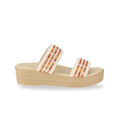 Side view of Thomas Chan Summer Love Boho low platform sandals in orange and white embroidery, featuring a comfort footbed. The platform, with a light brown braided element, measures 3cm at the front and 5cm at the back.