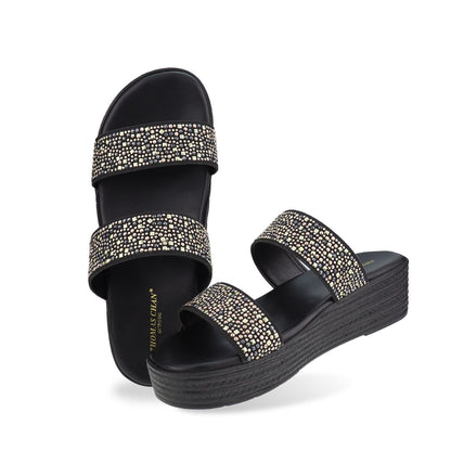 Full view of the Thomas Chan Strappy Rhinestone Flatform Sandals in black, featuring two elegant rhinestone-adorned straps and a cushioned footbed designed for maximum comfort. The platform, with a black braided element, measures 3cm at the front and 5cm at the back.