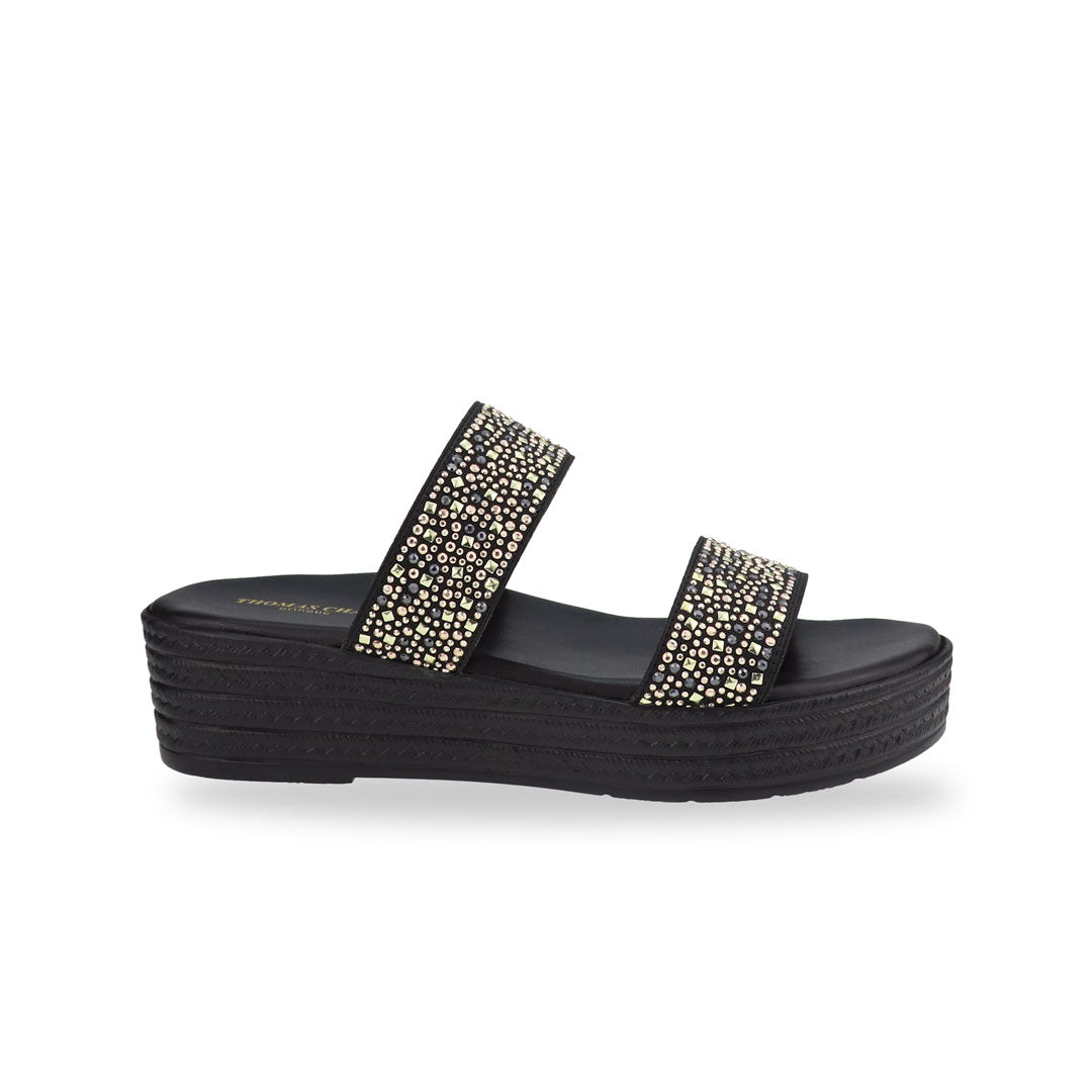 Side view of the Thomas Chan Strappy Rhinestone Flatform Sandals in black, featuring two elegant rhinestone-adorned straps and a cushioned footbed designed for maximum comfort. The platform, with a black braided element, measures 3cm at the front and 5cm at the back.