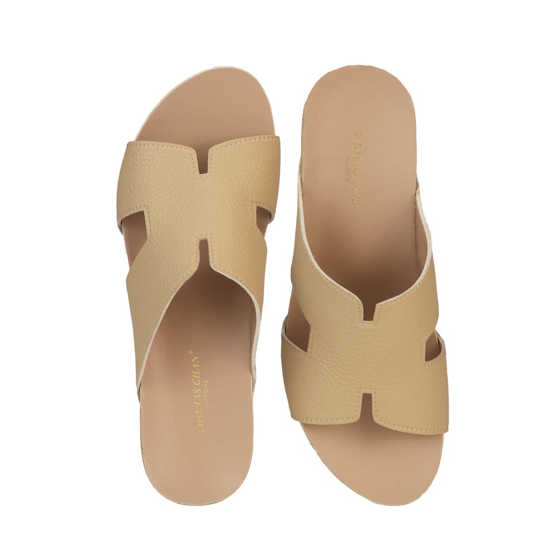 Front view of Thomas Chan mustard cream colour comfortable Pebble Lychee H-Strap Low Wedge Slides sandals with arch support footbed