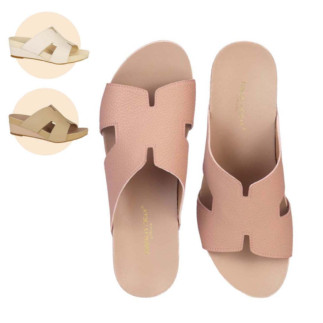  Thomas Chan Pebble Lychee H-Strap Low Wedge Slides in rosy pink, featuring an arch-support footbed. Also available in ivory and mustard cream.