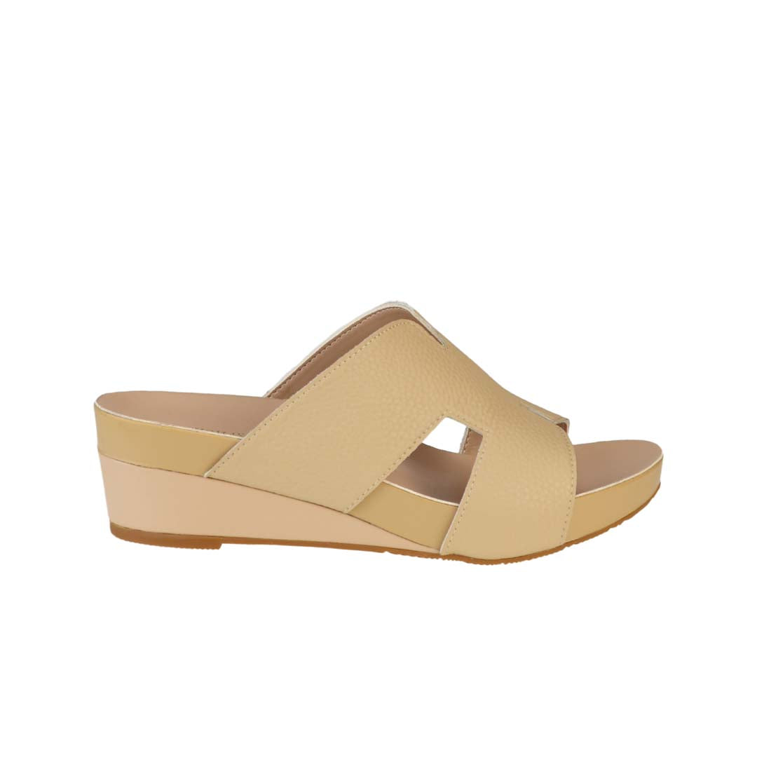 Side view of Thomas Chan mustard cream colour comfortable Pebble Lychee H-Strap Low Wedge Slides sandals with arch support footbed