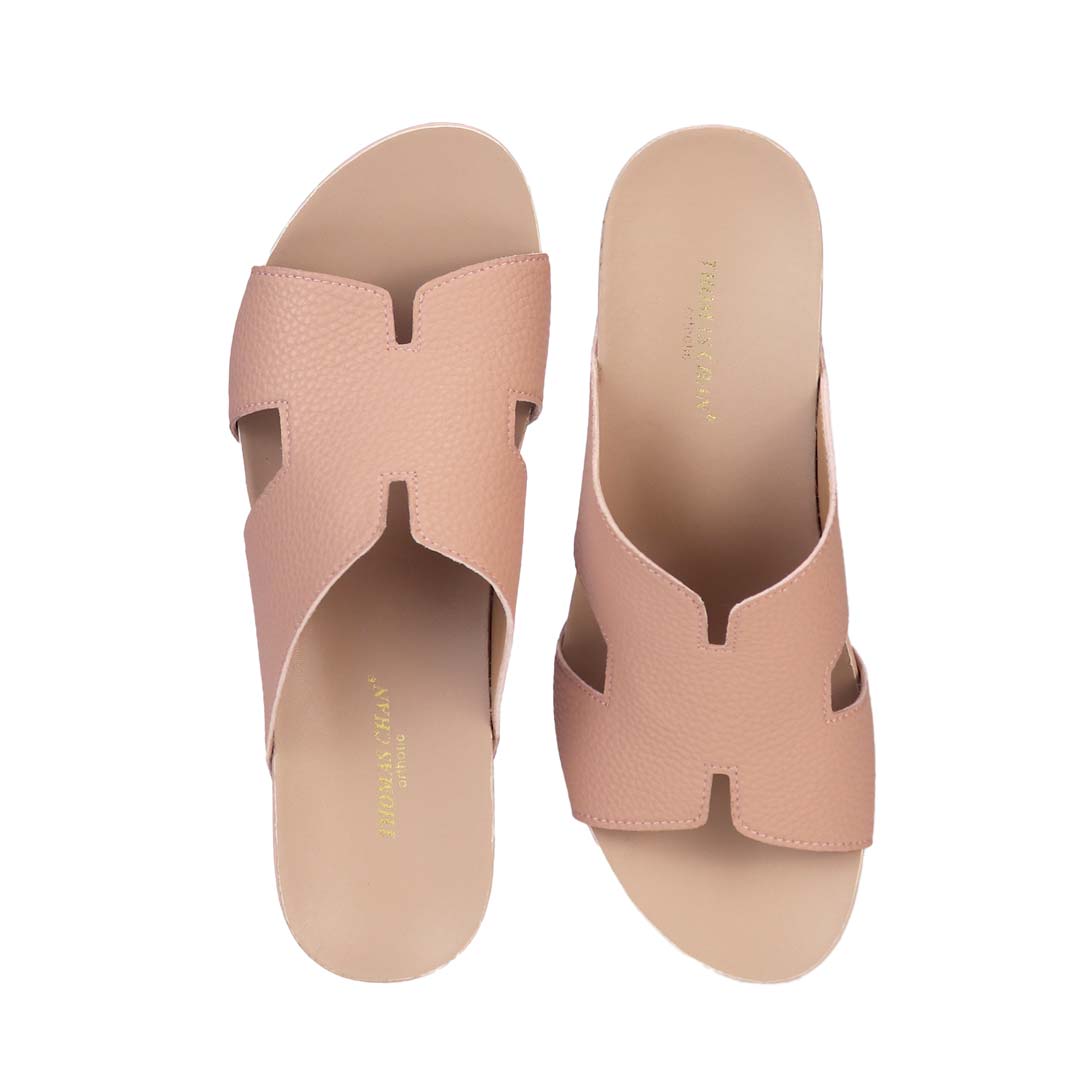 Front view of Thomas Chan peachy pink colour comfortable Pebble Lychee H-Strap Low Wedge Slides sandals with arch support footbed