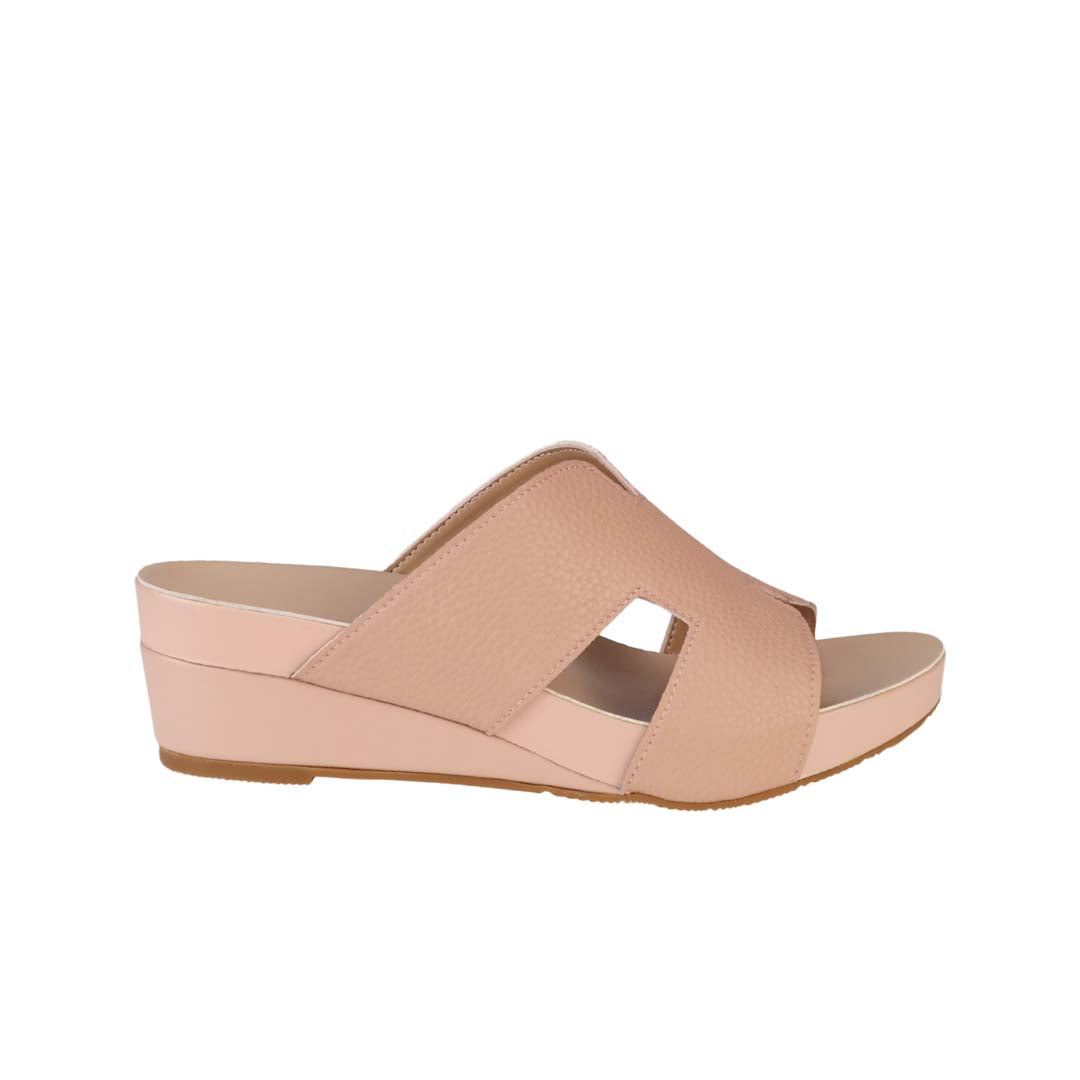 Side view of Thomas Chan peachy pink colour comfortable Pebble Lychee H-Strap Low Wedge Slides sandals with arch support footbed