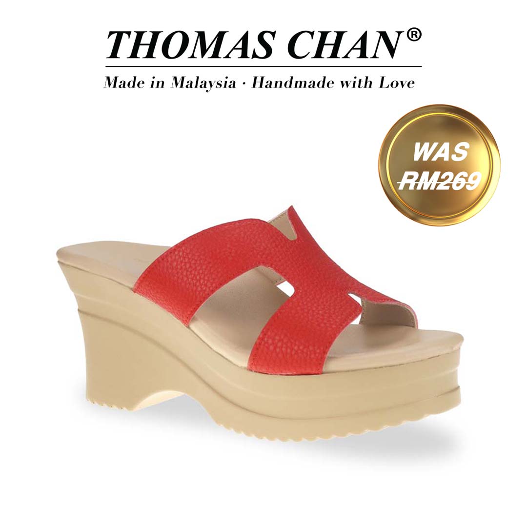 Thomas Chan's H-strap Cushioned Heels in red, featuring an pebble lychee leather print design and comfortable cushioned footbed. "THOMAS CHAN®" brand displayed with "Made in Malaysia · Handmade with Love" below. Gold and white banner highlights special offer: "WAS 269."