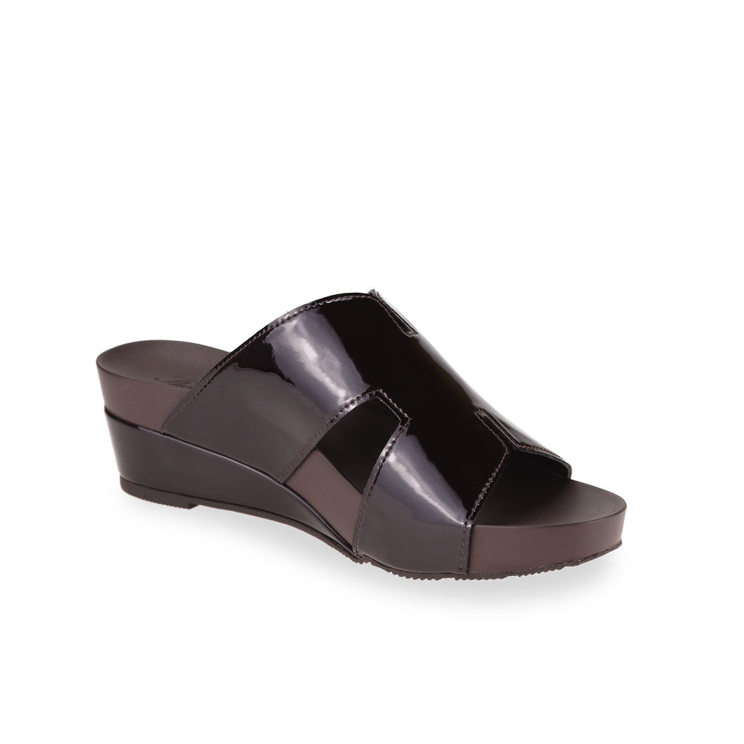 Diagonal view of Thomas Chan dark brown colour comfortable H-strap low wedge slide sandals with arch support