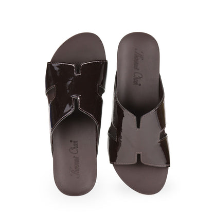 Front view of Thomas Chan dark brown colour comfortable H-strap low wedge slide sandals with arch support