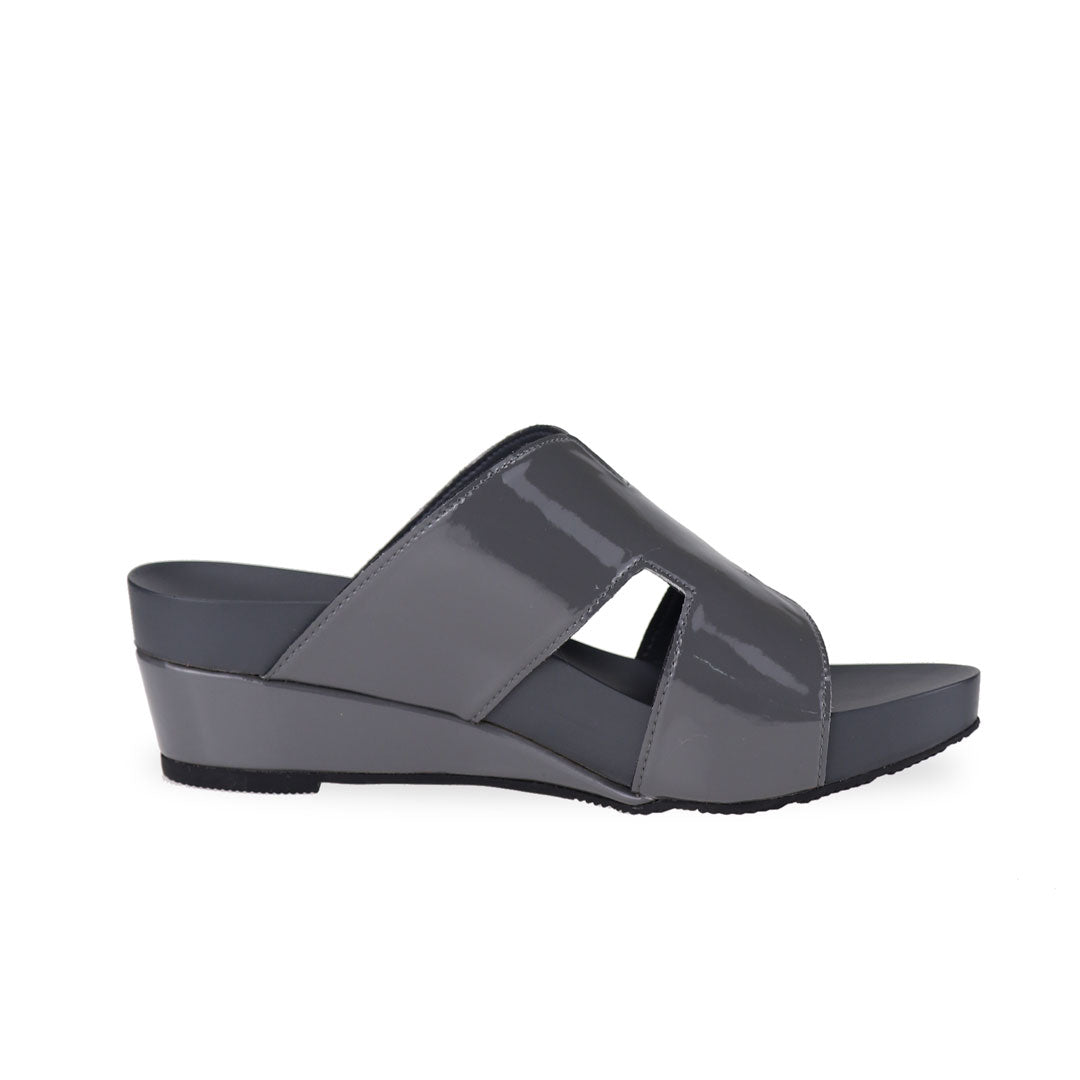 side view of Thomas Chan silverish grey colour comfortable H-strap low wedge slide sandals with arch support