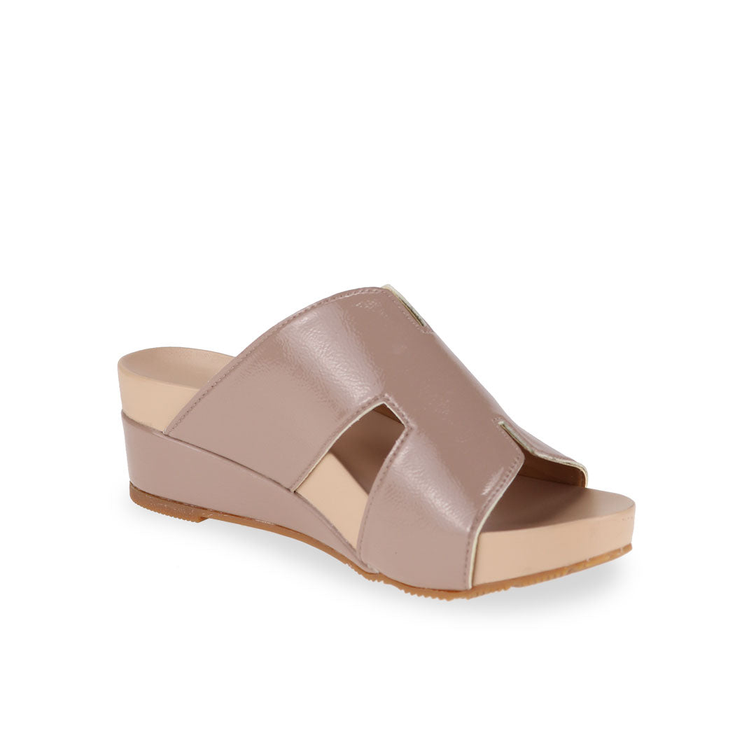 Diagonal view of Thomas Chan light taupe color comfortable H-strap low wedge slide sandals with arch support