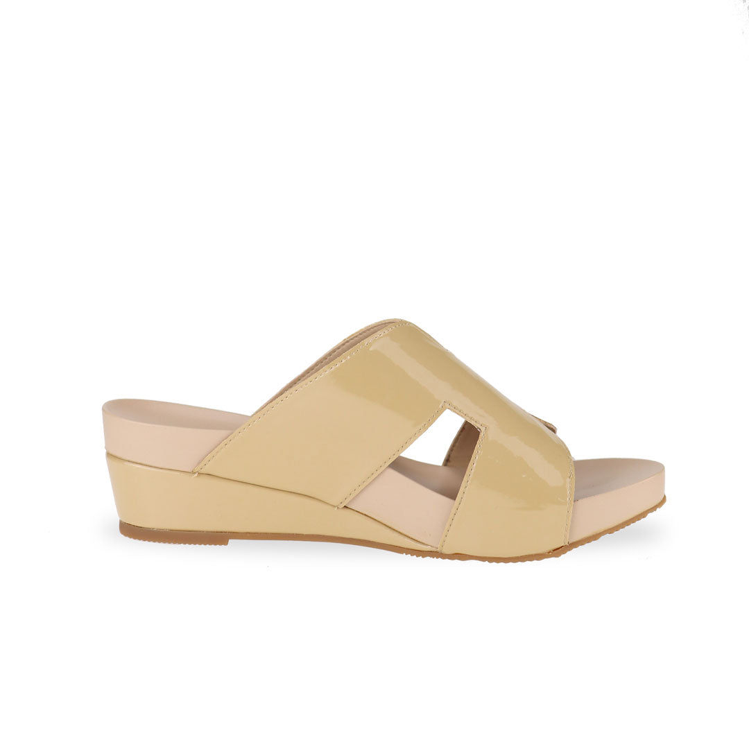 Side view of Thomas Chan pastel yellow color comfortable H-strap low wedge slide sandals with arch support