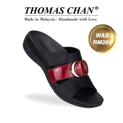 Thomas Chan's PU Cutout Slide Sandals in black and red patent, showcasing elegant design and featuring an arch-support footbed. Brand name "THOMAS CHAN®" prominently displayed with "Made in Malaysia · Handmade with Love" text below. Gold and white banner highlights special offer: "WAS 269."