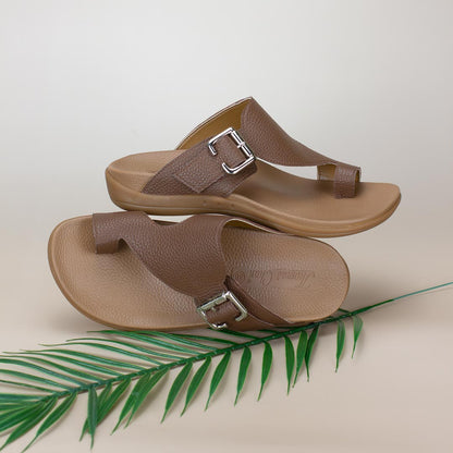 Light brown men's flip flop sandals with a comfortable toe loop design and arch support footbed by Thomas Chan.