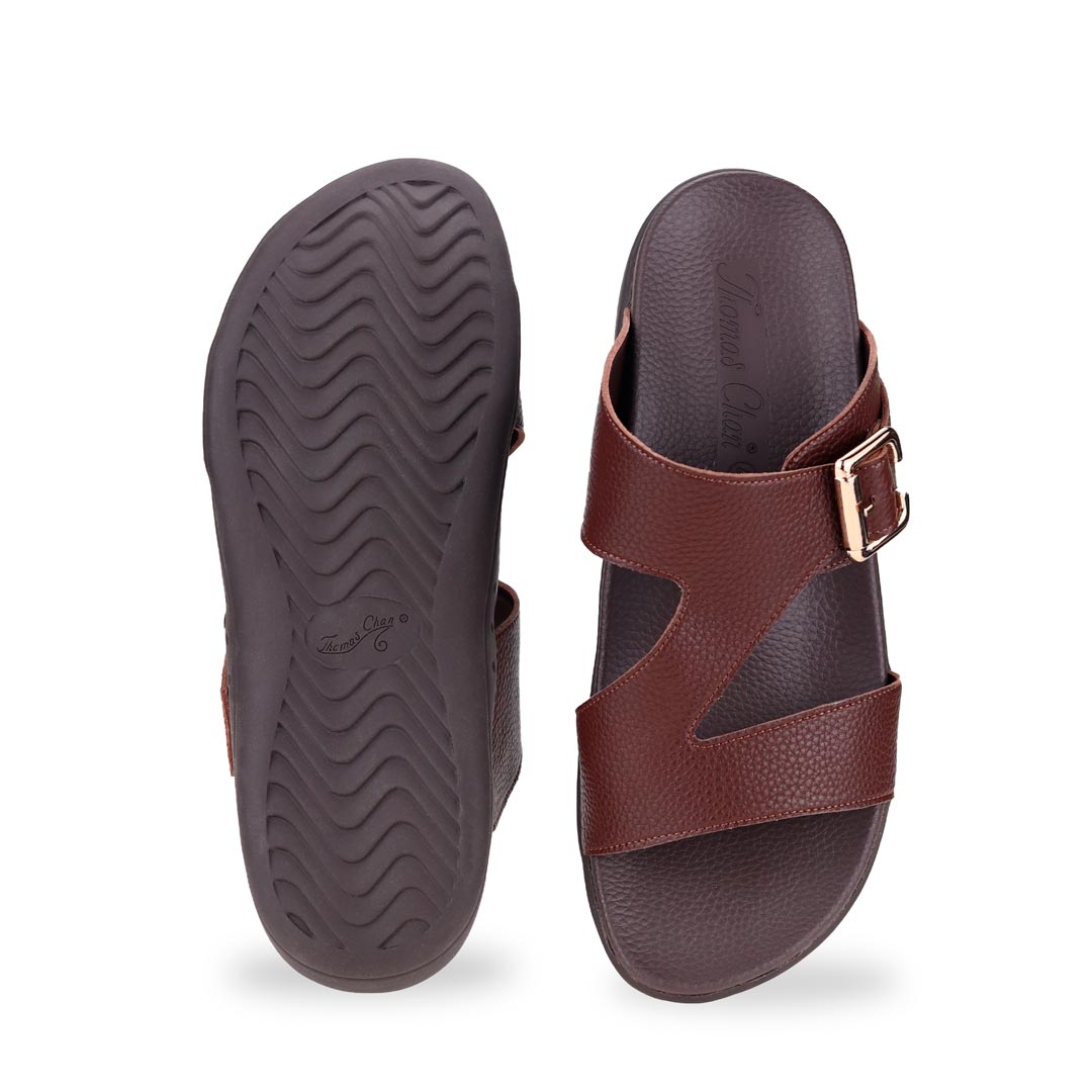 Back view of comfortable men's dark brown leather sandals with orthotic arch support footbed, featuring a special zig-zag design with buckle by Thomas Chan