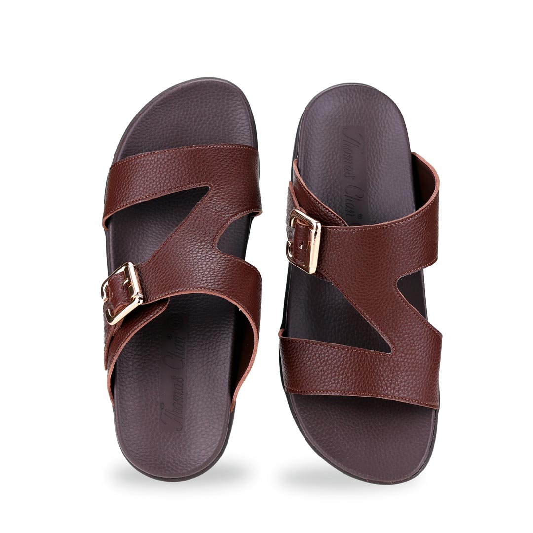 Front view of comfortable men's dark brown leather sandals with orthotic arch support footbed, featuring a special zig-zag design with buckle by Thomas Chan