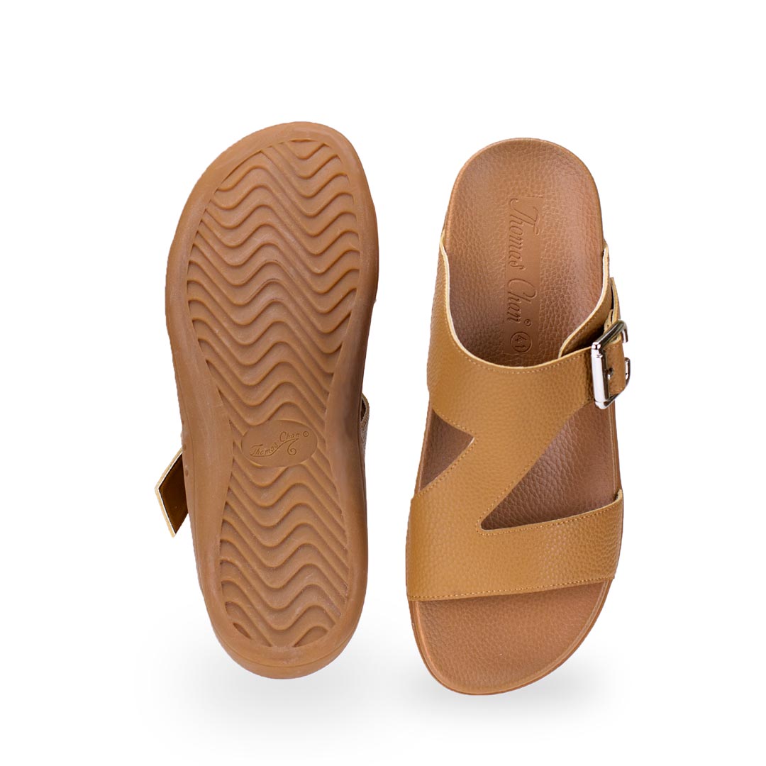 Back view of comfortable men's light brown leather sandals with orthotic arch support footbed, featuring a special zig-zag design with buckle by Thomas Chan