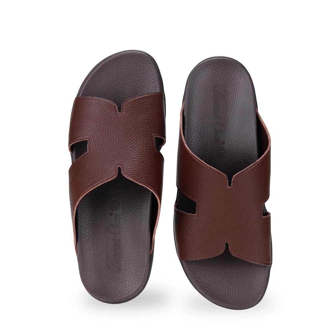 Front view of dark brown comfortable men's leather H-strap sandals with arch-supporting footbed