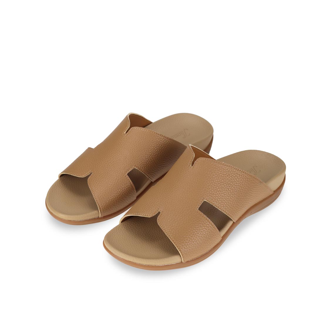 Diagonal view of light brown comfortable men's leather H-strap sandals with arch-supporting footbed