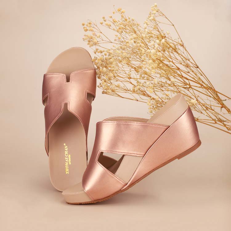 Simple and elegant rose gold Thomas Chan ultra comfortable H strap wedge sandals glossy and shiny finishing