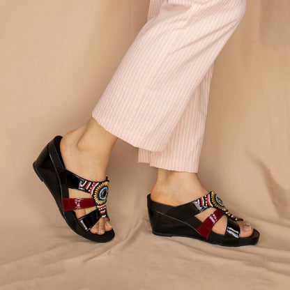 Model showcasing Thomas Chan Triple Straps Bead High Wedges in black with a mixture of red colour patent in the middle stripe, featuring arch support insole.