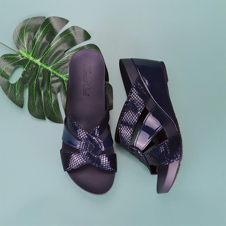 Classic navy blue colour wedge sandals in snake print design and comfortable Thomas Chan orthotic insoles for casual and comfort